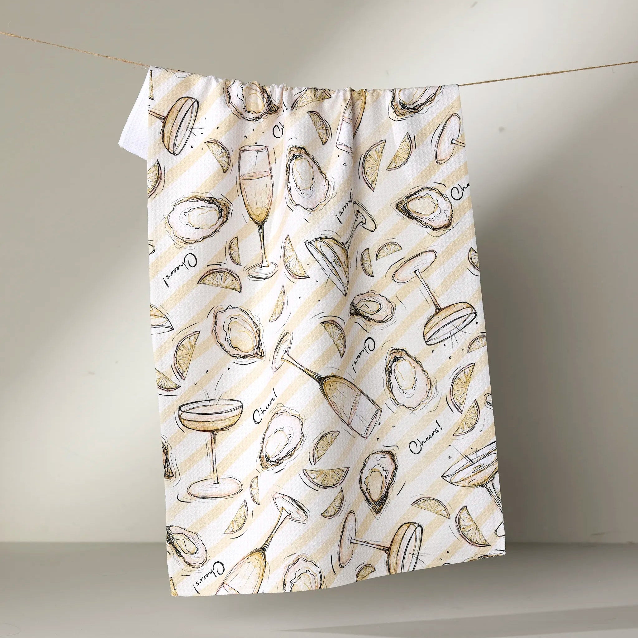 oysters and champagne tea towel hanging