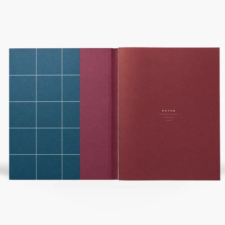 UMA Large Softcover Notebook | Dark Blue inside cover.