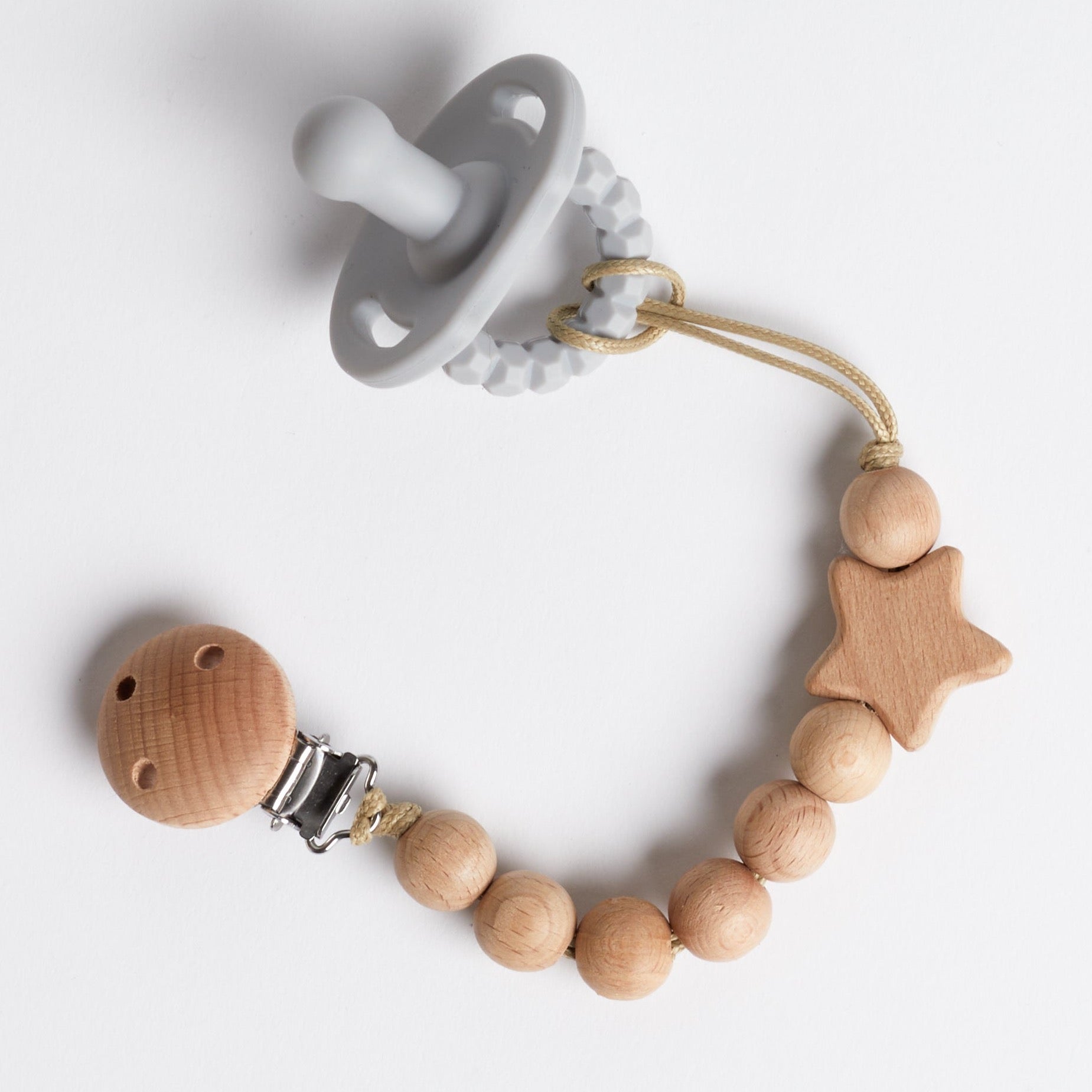 Wooden teether clip with star.