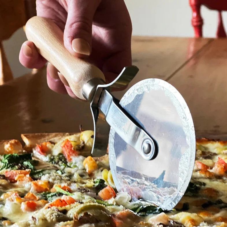 Verve Pizza Cutter slicing pizza