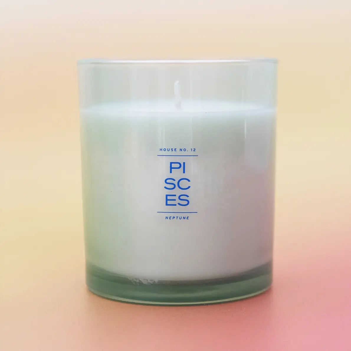 Candle labeled 'PISCES' with a gradient background