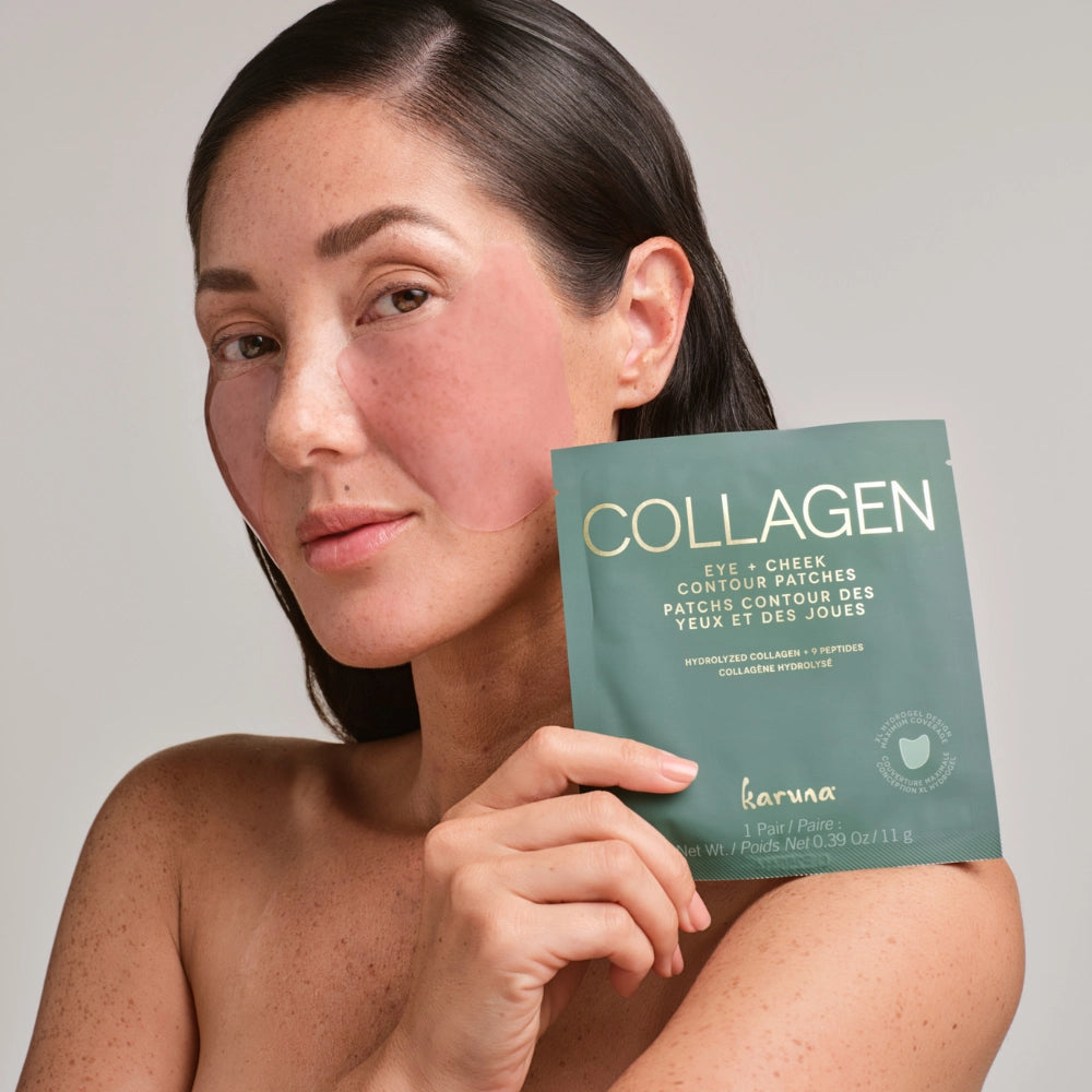 Woman holding a package of Karuna Collagen patches against a neutral background