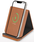 Brown wireless charging stand with smartphone displaying charging progress on a white background