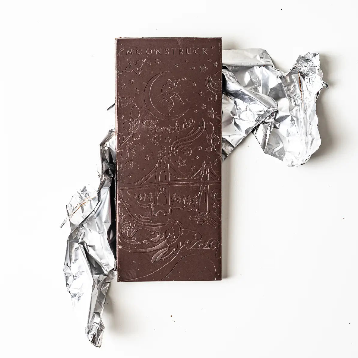 Chocolate bar with decorative packaging on a white background