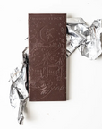 Chocolate bar with decorative packaging on a white background