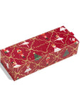 A rectangular gift box wrapped in festive red paper with gold ribbon motifs, ballerina figures, nutcrackers, Christmas trees, and the word 'agafina' printed on the side, shown on a white background.