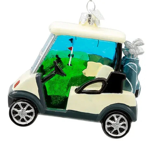 tan golf cart ornament with a golf course background