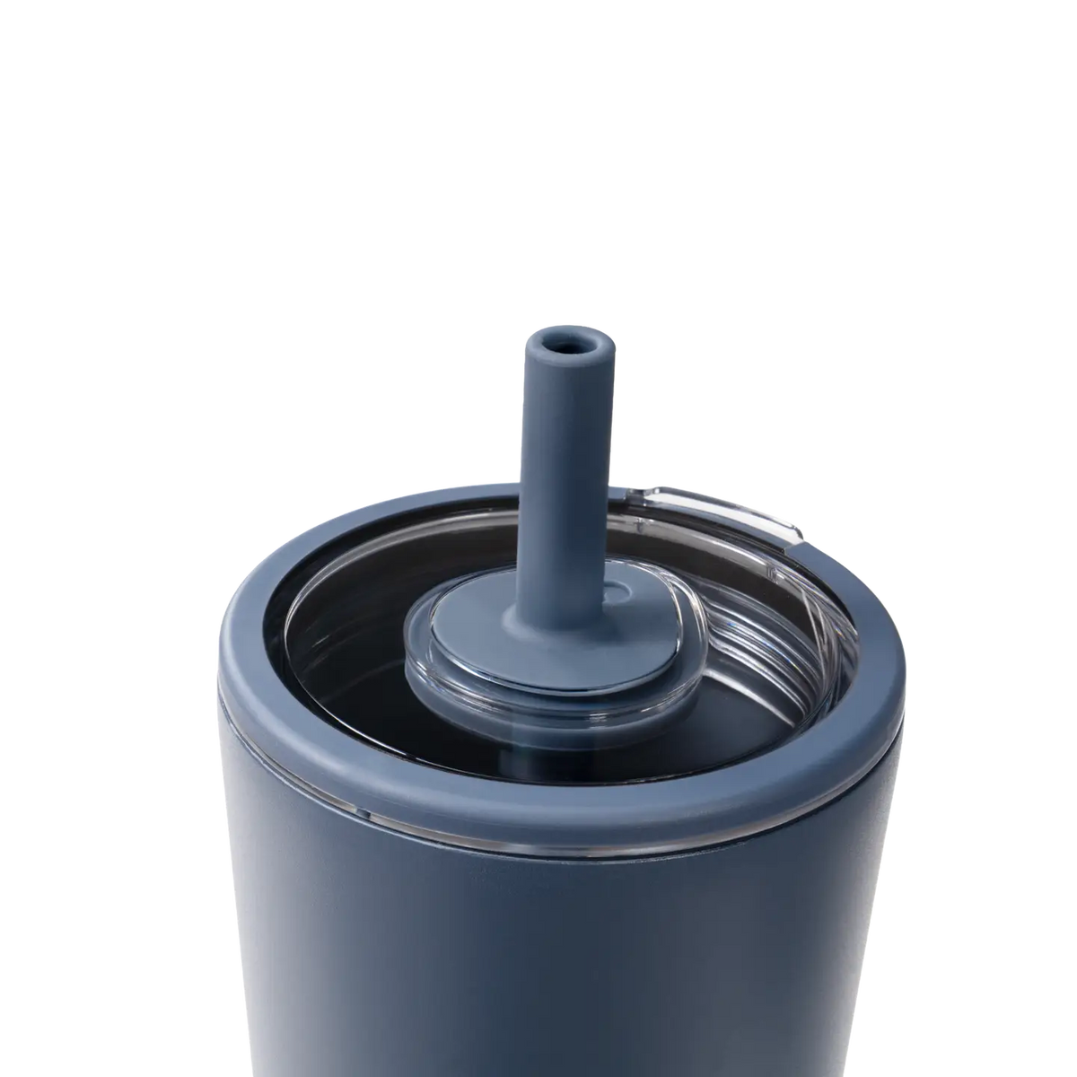 Close-up of a matte slate blue insulated tumbler with a clear lid and matching blue straw insert, shown on a white background.