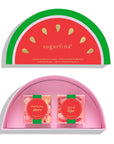 sugarfina candy box shaped like a watermelon slice with two candy packages inside.