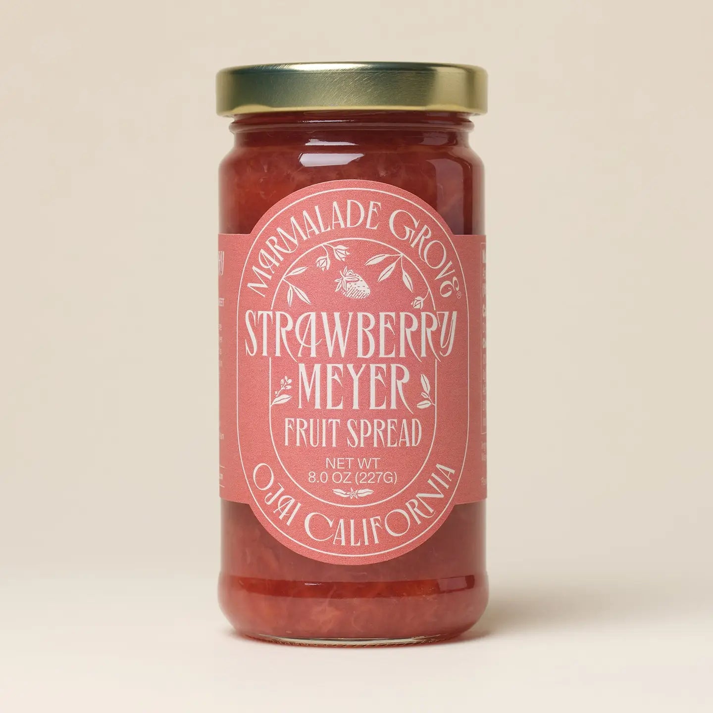 strawberry meyer fruit spread on a beige background