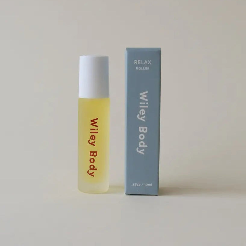 Yellow bottle and blue box labeled 'Wiley Body' on a light gray background