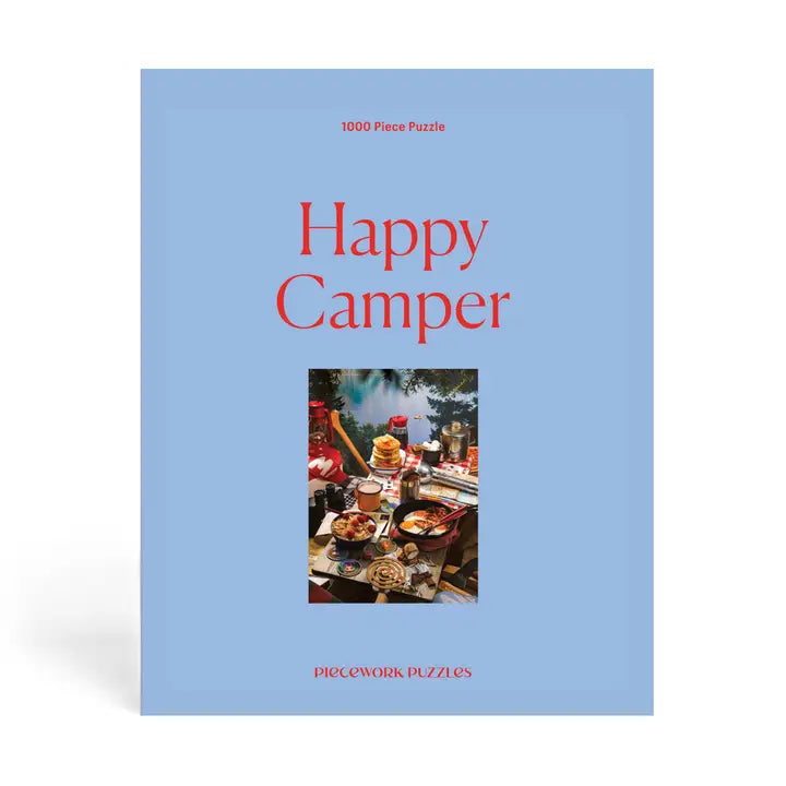 Happy Camper puzzle book cover with a blue background and image of a camper setup.