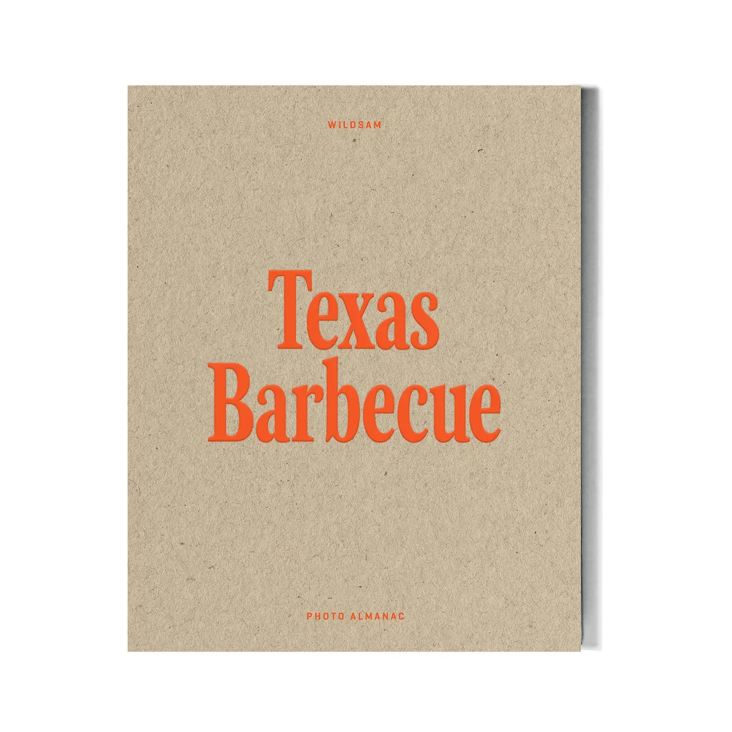Book titled 'Texas Barbecue' with red text on a beige background