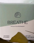 Breathe Shower Steamer surrounded by eucalyptus