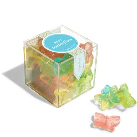 candy cube filled with multicolored butterfly shaped gummies