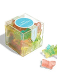 candy cube filled with multicolored butterfly shaped gummies