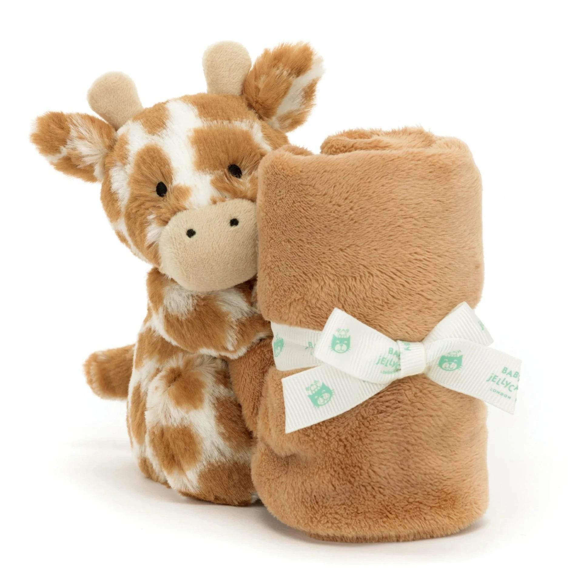 caramel colored giraffe stuffed animal with blanket attached