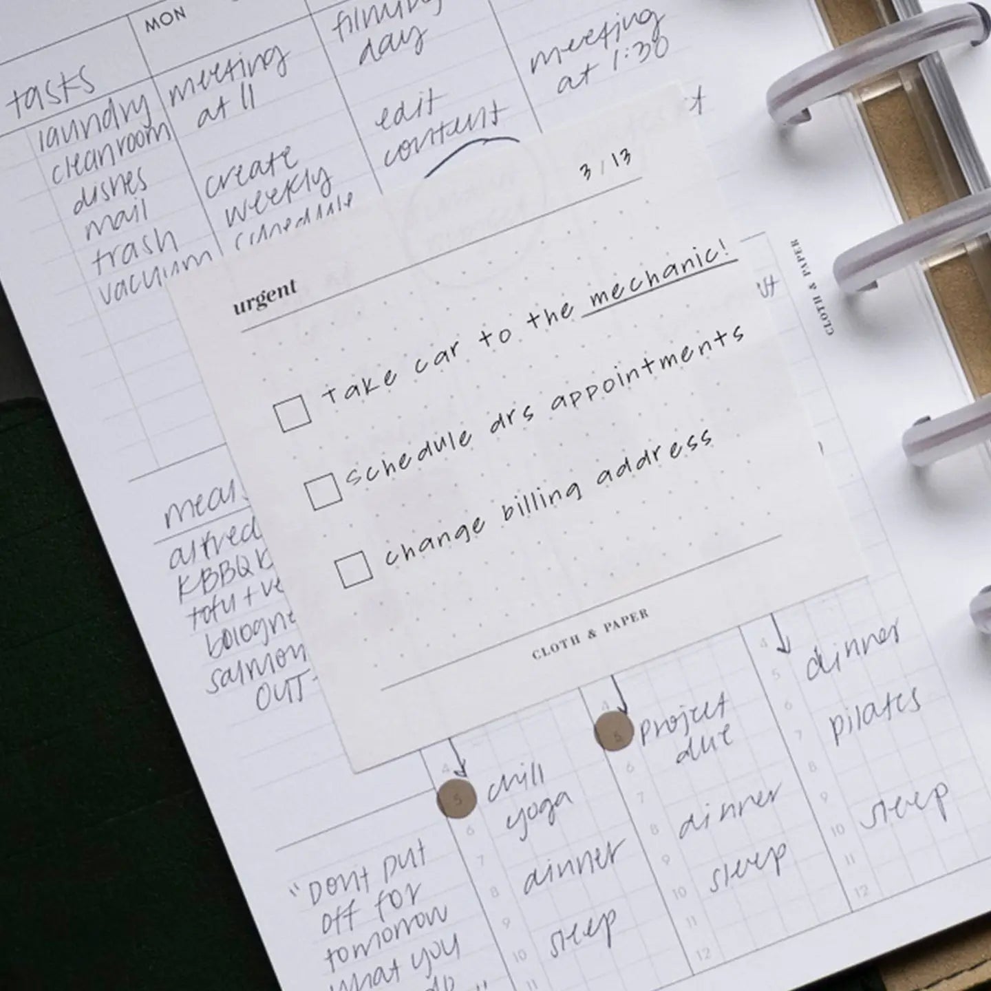 Planner with handwritten tasks and appointments