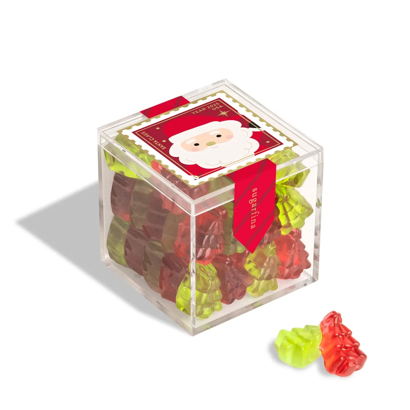 Clear cube box filled with gummy bears featuring a Santa Claus design on a white background.