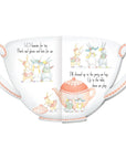 Teacup-shaped book with illustrations of bunnies and a teapot on a white background