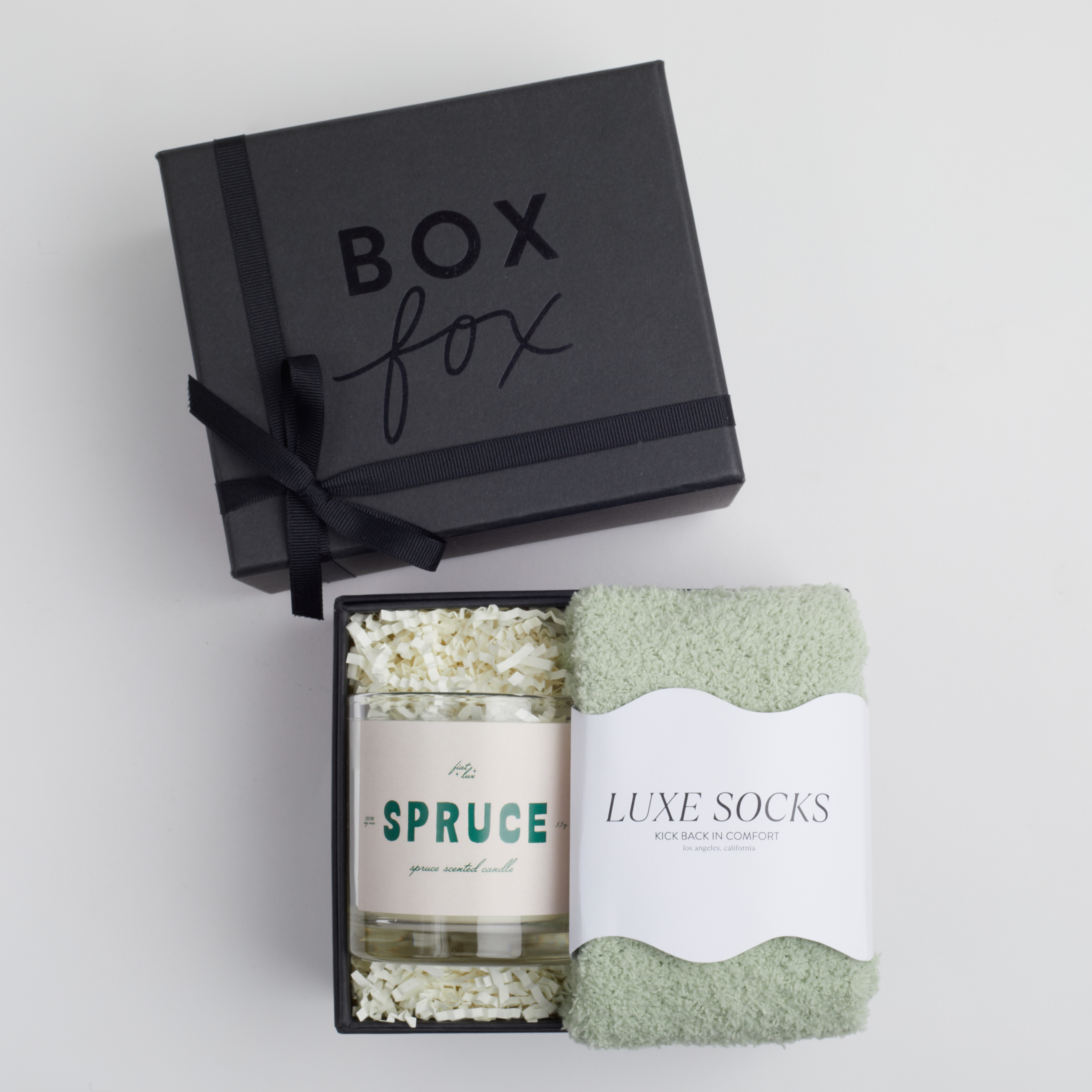 BOXFOX mini black box packed spruce candle and luxe green cozy socks
