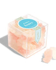 clear candy cube filled with champagne flavored gummy bears