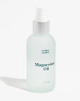 Bottle of magnesium oil with 'mother mother' branding on a white background