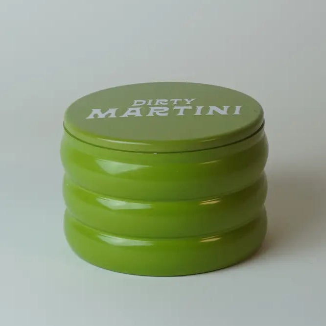 Green container with 'Dirty Martini' text on a white background