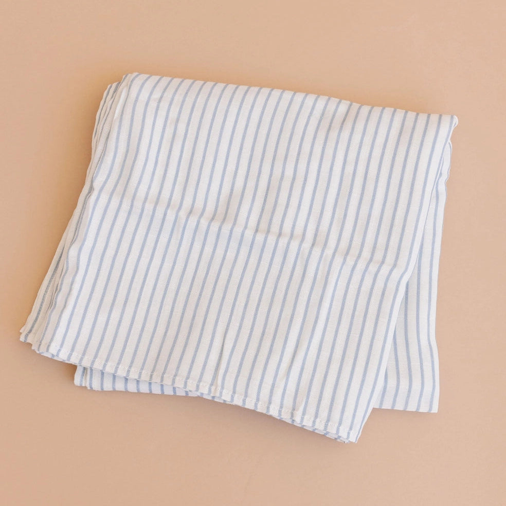Striped fabric on a beige background