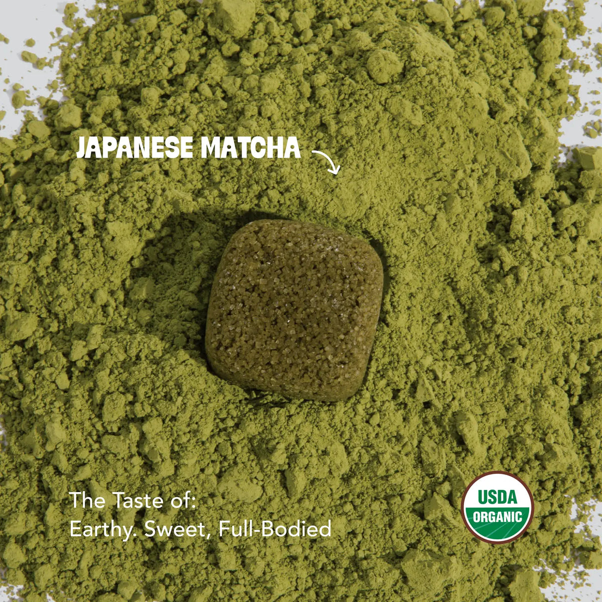 Japanese matcha powder with a stone and USDA Organic label.