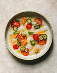 crudo fish dish with jalapeno and tomato