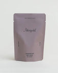 A lavender-gray stand-up pouch package with the brand name 'Meseek' printed in black, centered against a seamless white background.