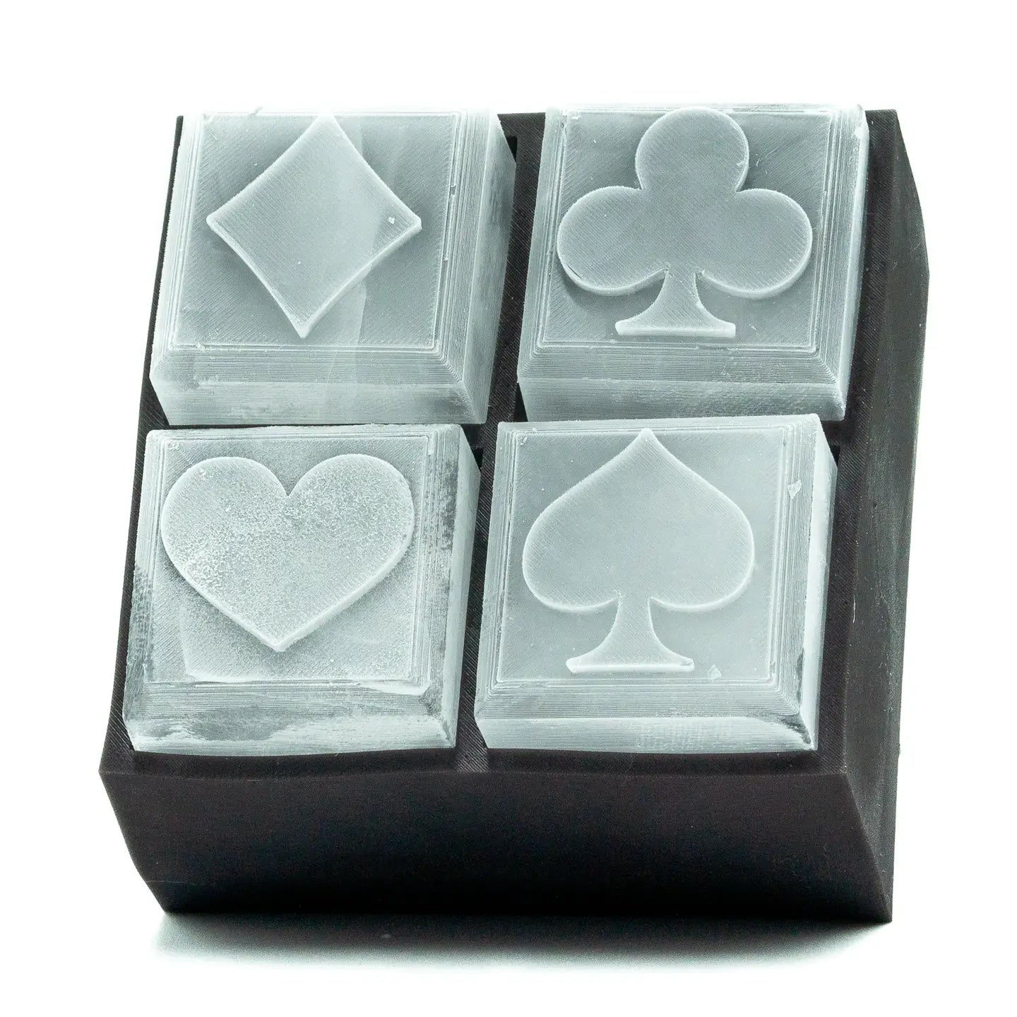 Clear plastic playing card boxes with suits on a white background