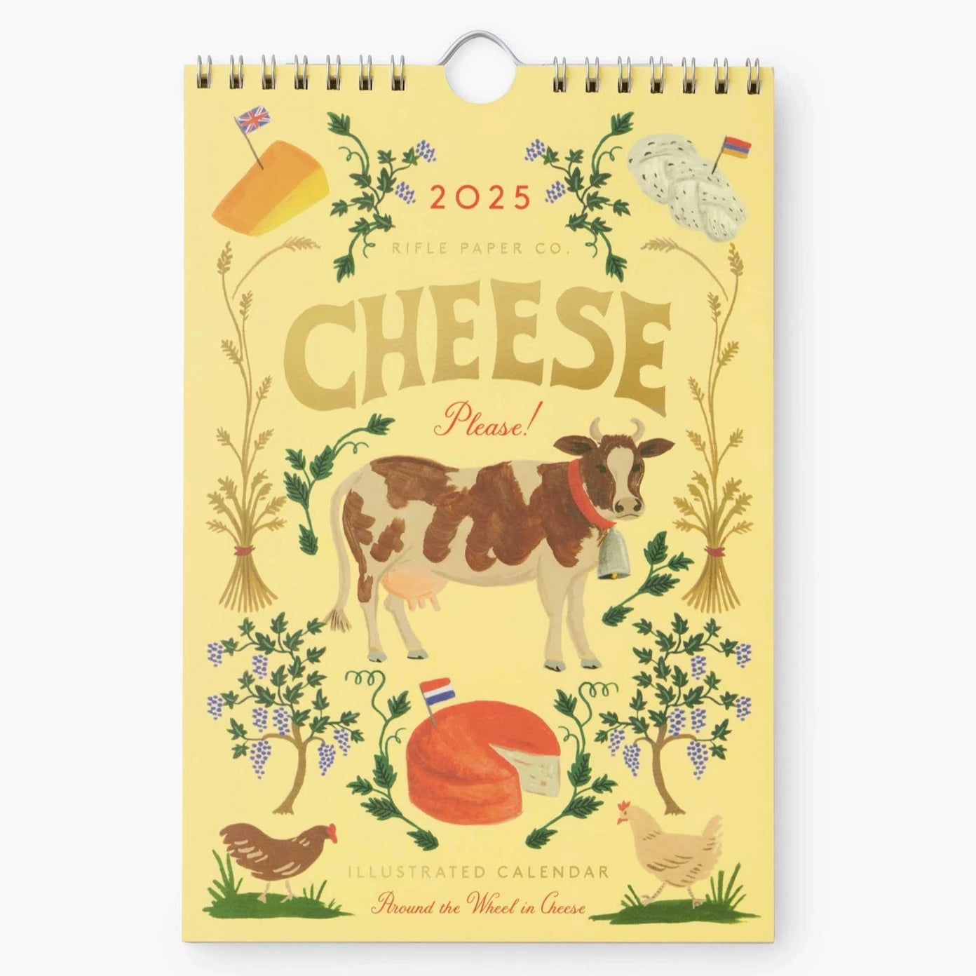 Illustrated cover of the 2025 Cheese Calendar by Rifle Paper Co. The design features a yellow background with a cow, cheeses, floral decorations, and text that reads 'CHEESE Please! Illustrated Calendar.