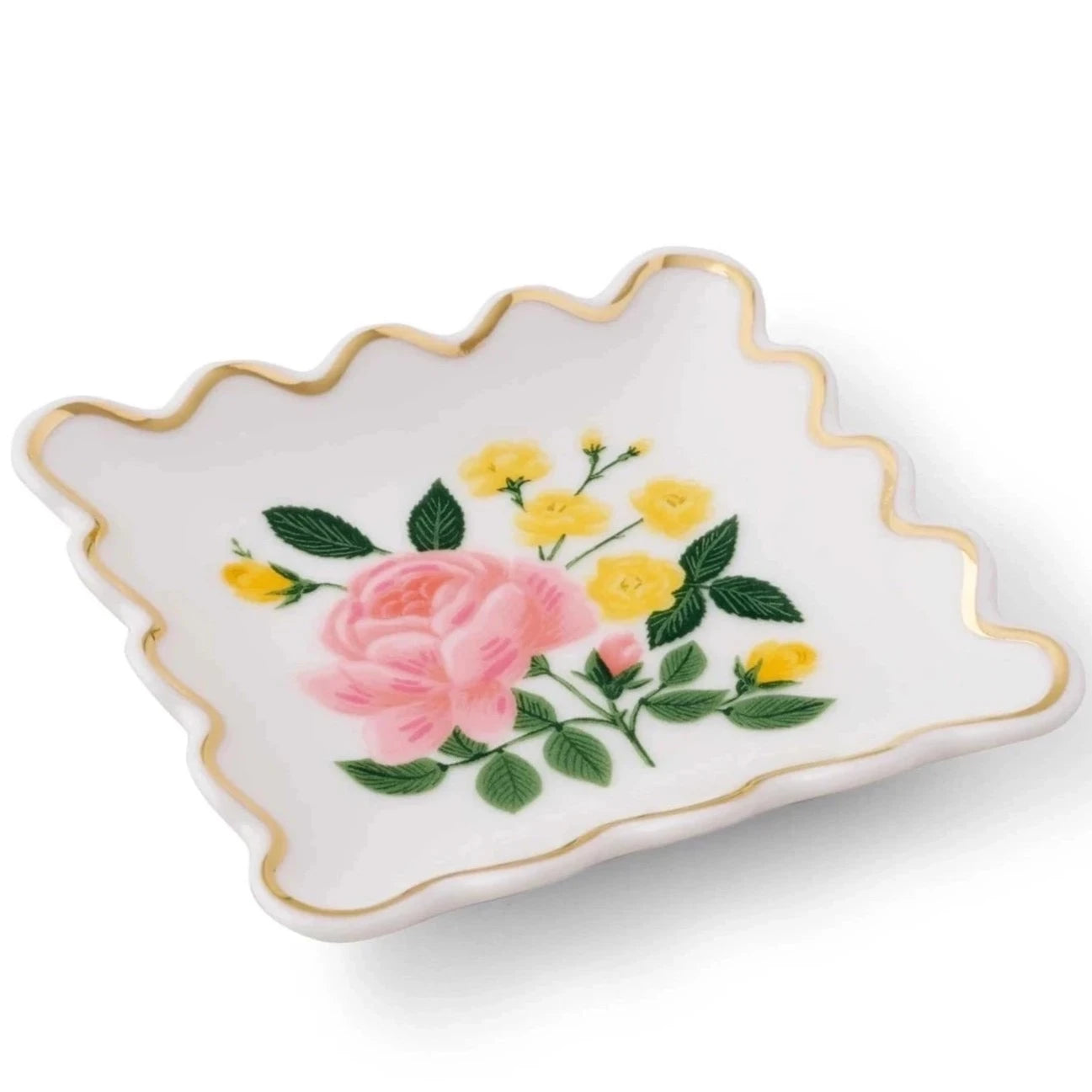 white rectangular ring dish with scalloped edges. in the center is a rose