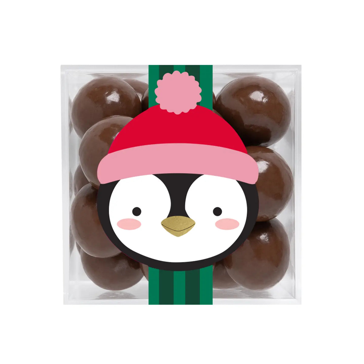 A clear square plastic container filled with glossy dark brown chocolate-covered candies, decorated with a penguin illustration wearing a red and pink Santa hat and green striped scarf on a white background.