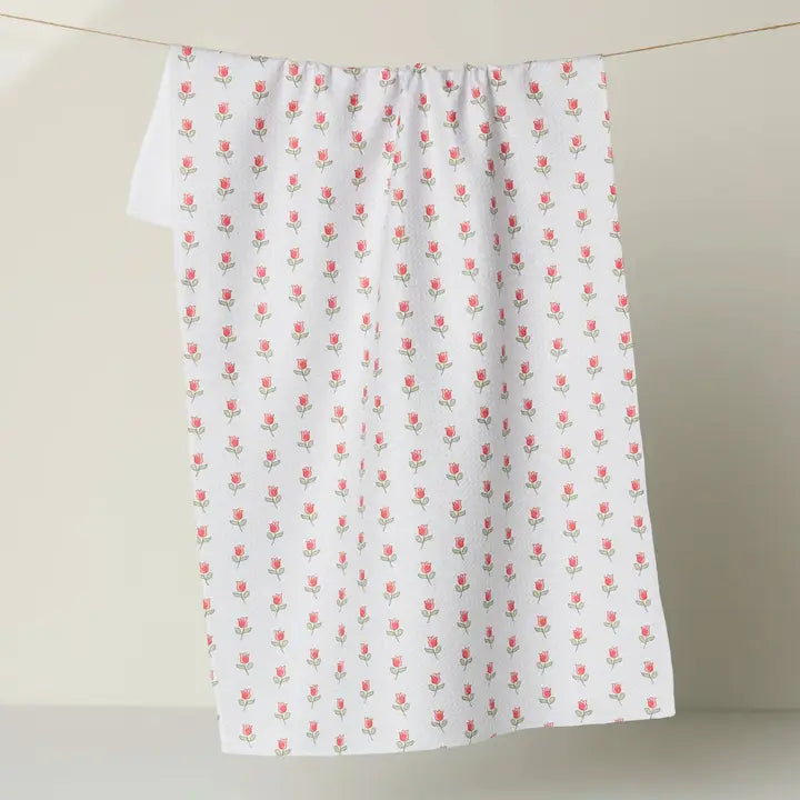 tulip tea towel hanging up on a white background