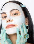 girl wearing light blue sheet mask
