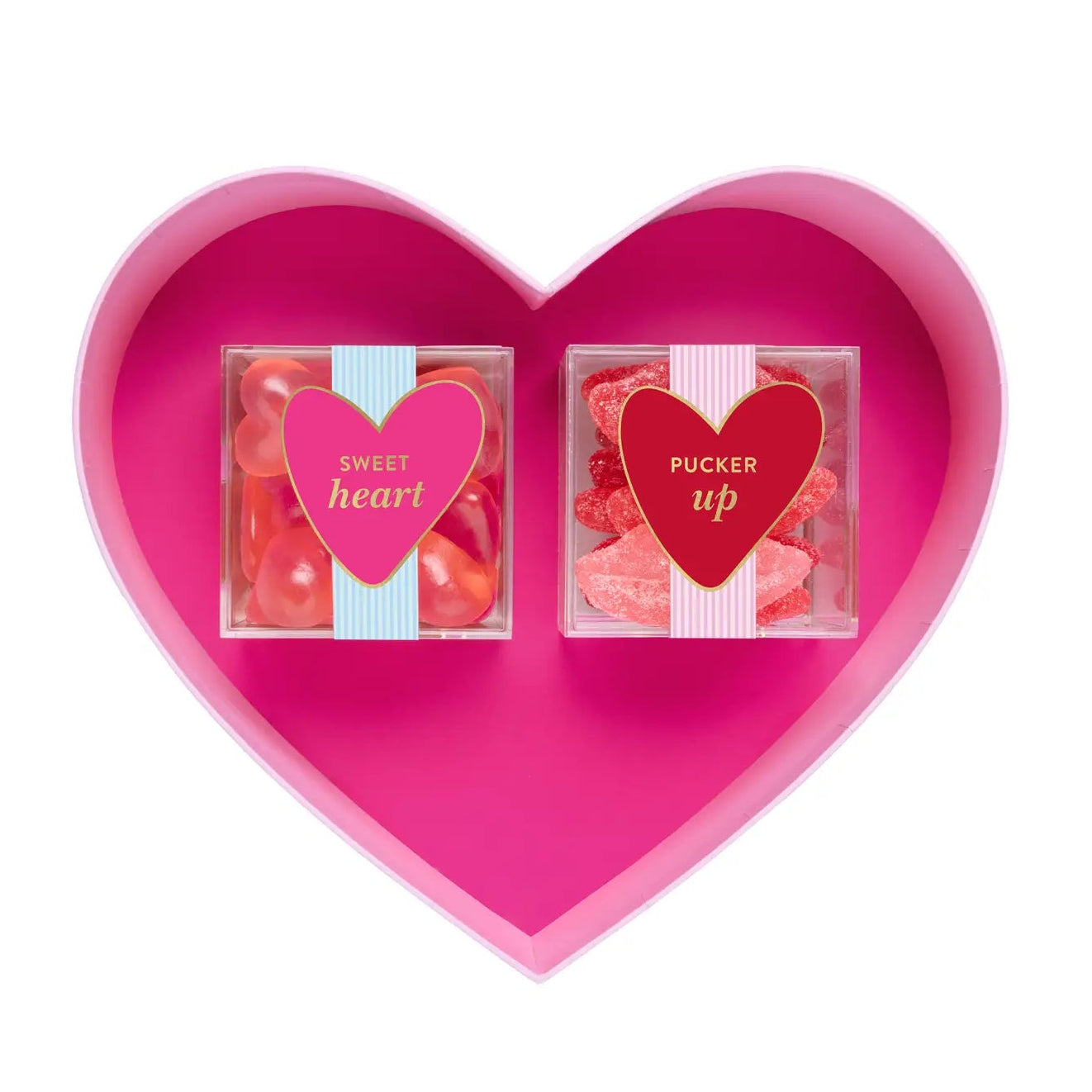 Heart-shaped pink container with two candy packages labeled 'Sweet Heart' and 'Pucker Up' on a white background.