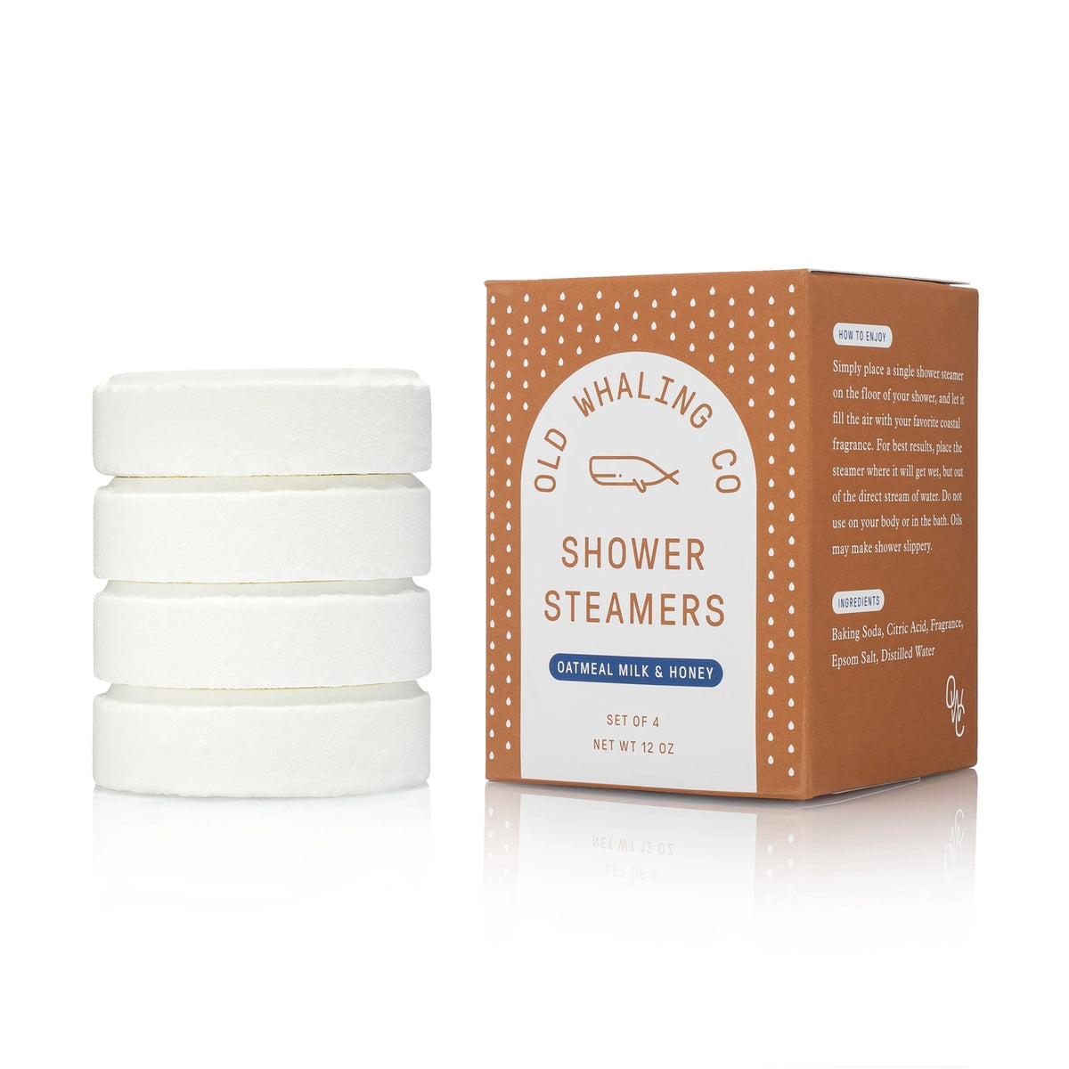 Set of white shower steamers with a brown and white packaging box on a white background