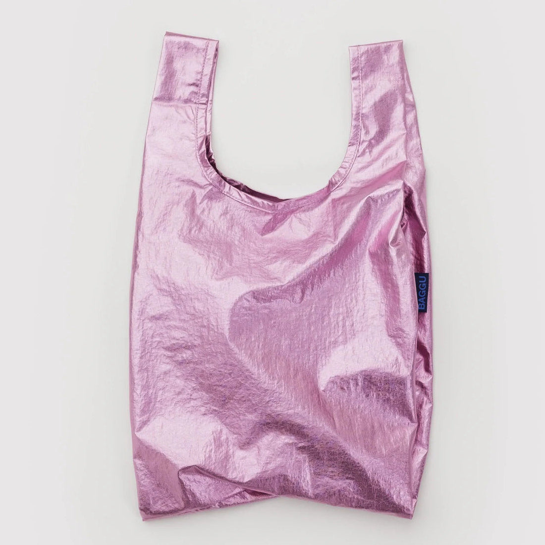 Pink reusable bag on a light gray background