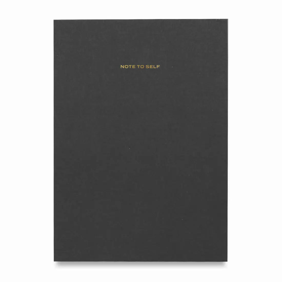 Black notebook with 'Note to Self' text on a white background