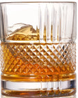 crystal whiskey glass with whiskey in it