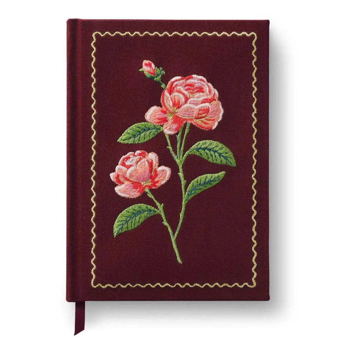 maroon fabric journal with pink roses embroidered on it