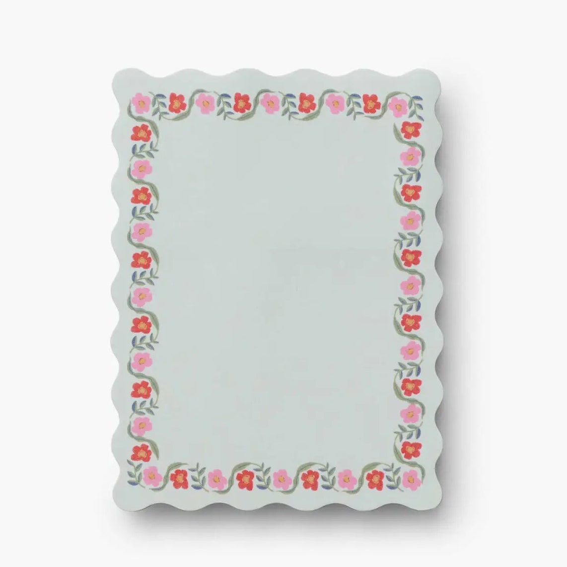 Notepad with floral border on a white background