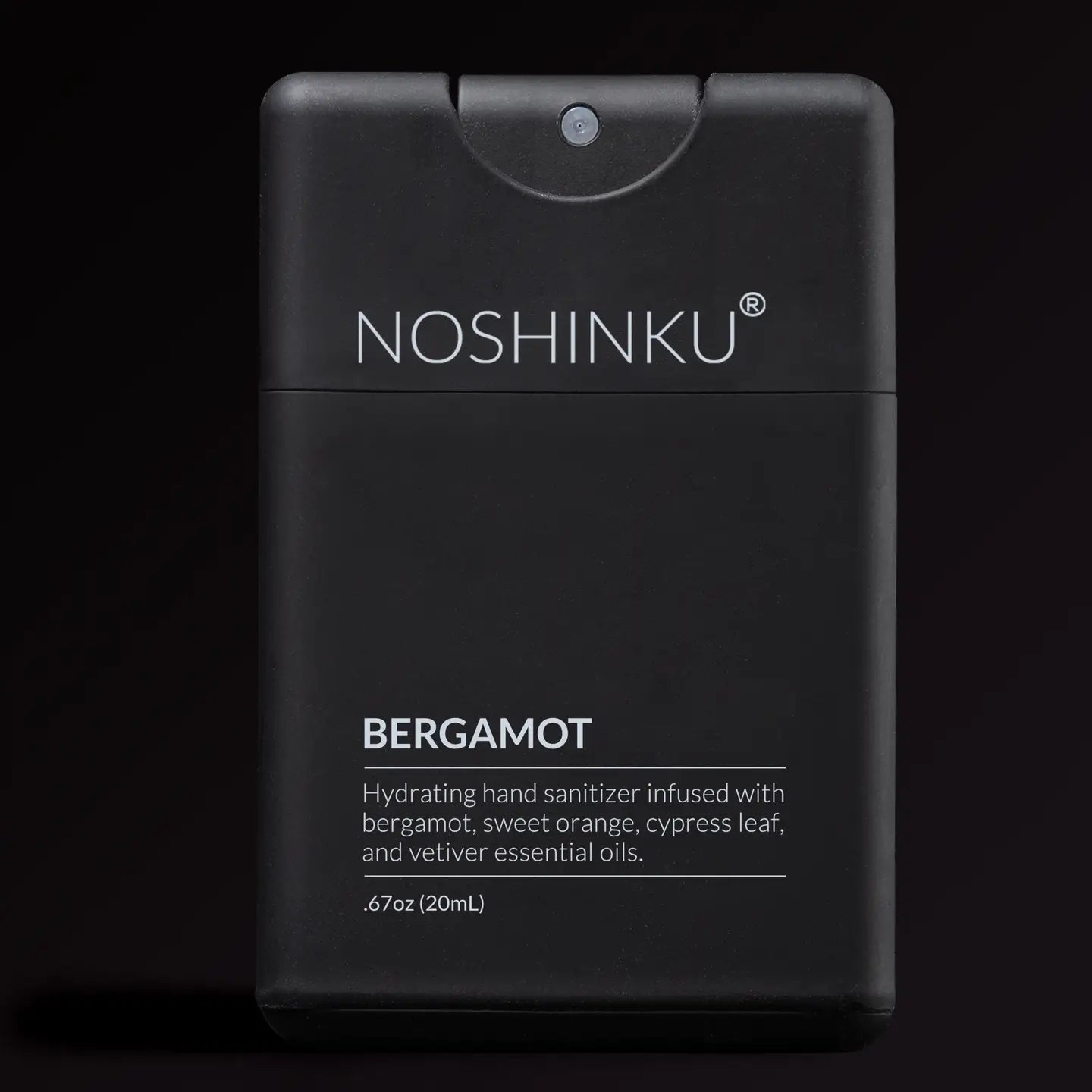 Black hand sanitizer bottle with 'Noshinku' branding on a black background