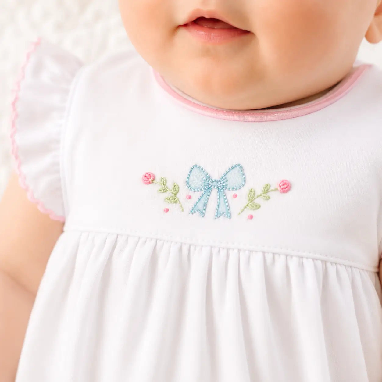 close up of evelyn's romper