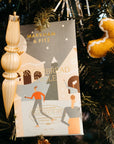 Chocolate bar packaging with 'Markham & Fitz' on a Christmas tree with gingerbread man ornament.