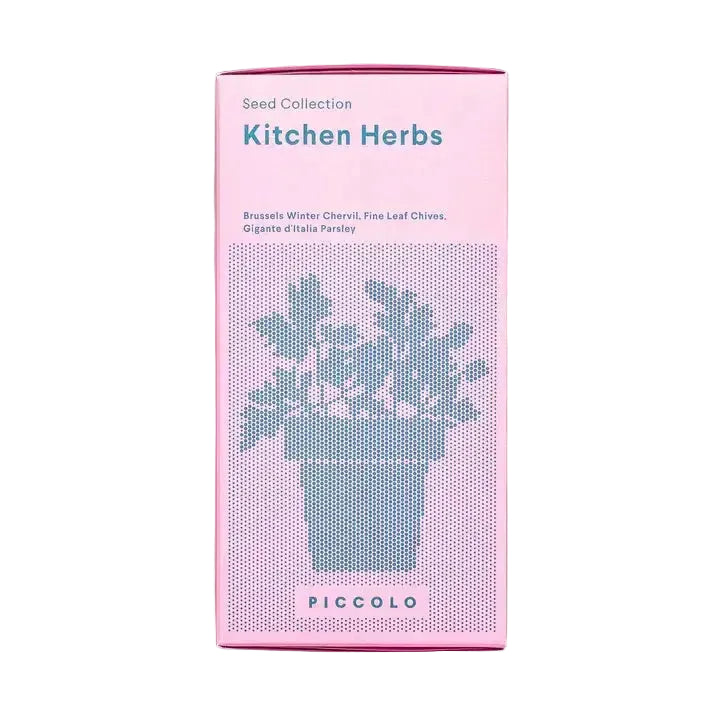 Pink packaging of 'Kitchen Herbs' seed collection on a green background