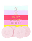 Pink flower steamers with a colorful 'Happy Birthday To You!' card on a white background